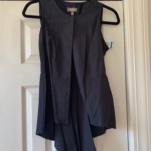 Neiman Marcus XS Navy peplum shirt. Cotton and spandex NWT.